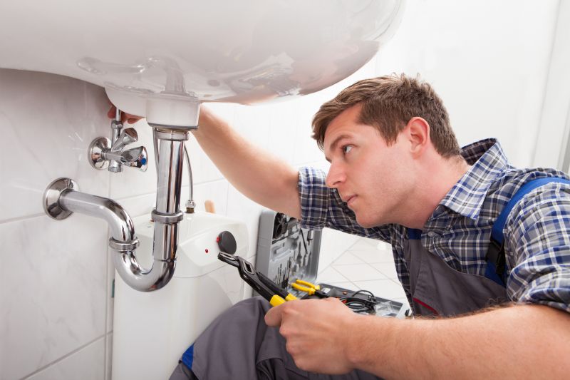 Plumbing Technician at Work
